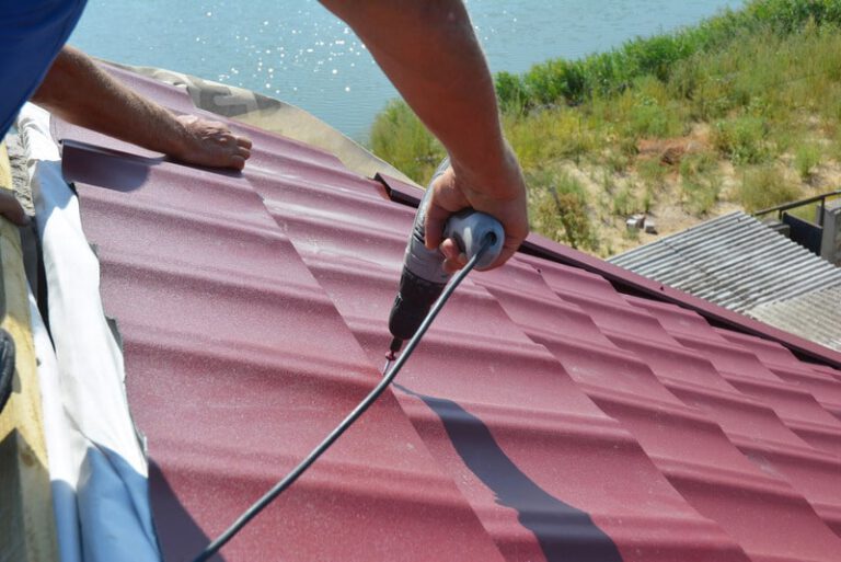 roofer contractor installing metal Roofers College Station TX